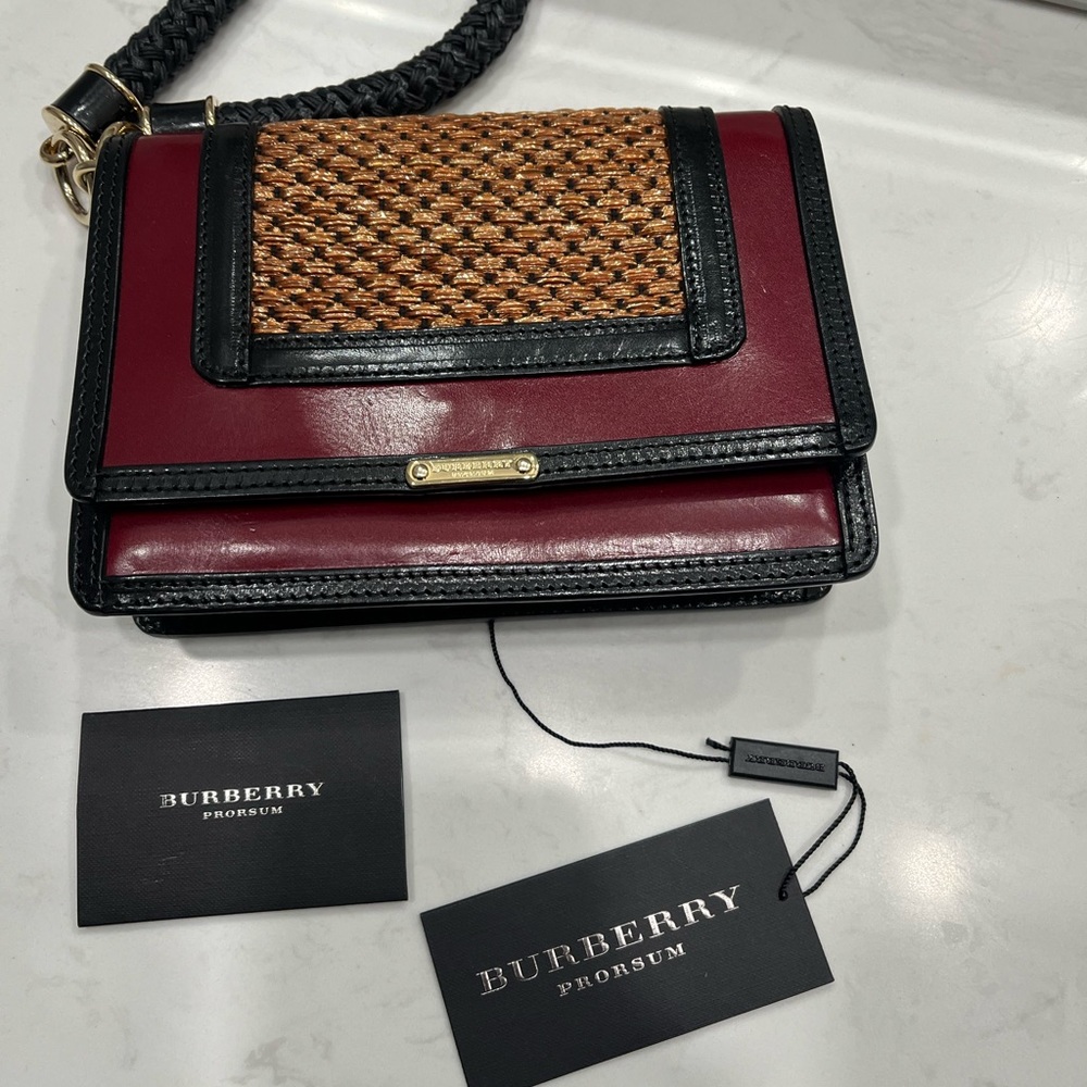BURBERRY Prorsum leather and raffia
Woven Detail Clutch /Wristlet Purse with COA